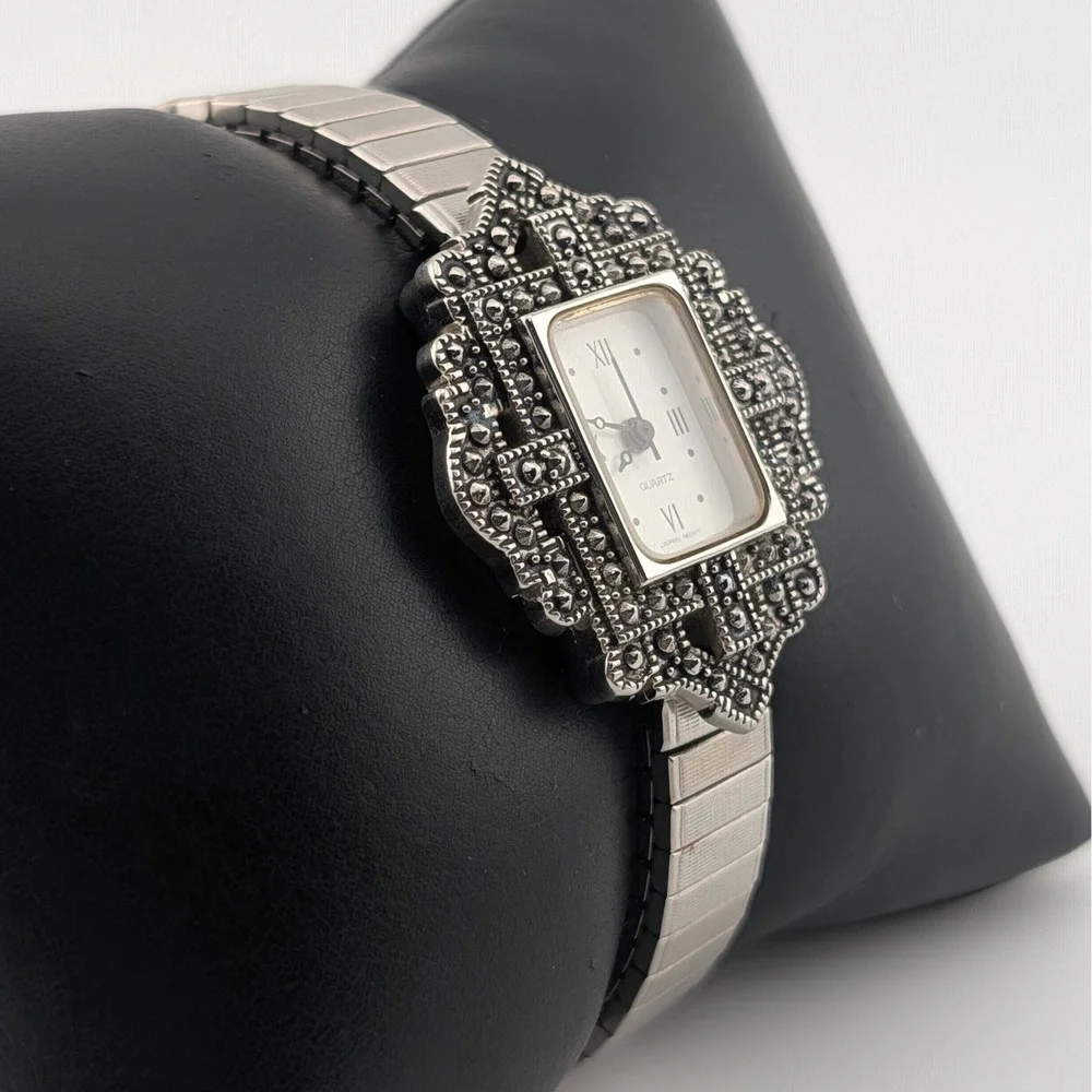 Avon silver tone